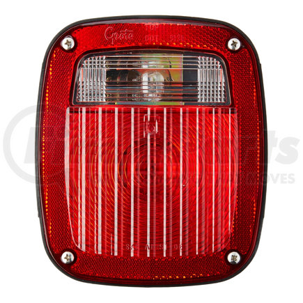 50952 by GROTE - Torsion Mount Three-Stud Navistar Volvo Stop Tail Turn Light, LH w/ License Window, Red