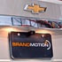 90027601 by BRANDMOTION - Universal Dual Mount CMOS Camera; Metal License Plate and Camera Mount; 22ft. Chassis Harness To RCA Included; Parking Gridlines and Image Mirroring Available;